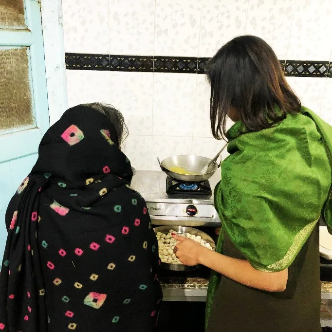 Two women cooking in a kitchen